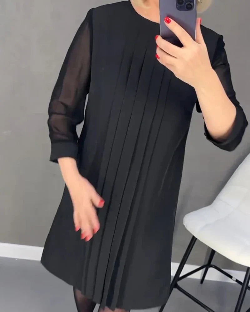 Pleated knitted dress