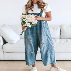 Loose fit distressed denim jumpsuit